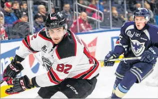  ?? QUEBEC REMPARTS PHOTO/JONATHAN ROY ?? Jesse Sutton (82), shown playing against the Sherbrooke Phoenix last season, had been a consistent performer and popular player with the QMJHL’S Quebec Remparts, but an overabunda­nce of overage players on the Remparts’ roster, led to his being traded to the Chicoutimi Sagueneens over the weekend.