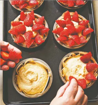  ?? PATRICIA NIVEN ?? “This is a big favourite of mine,” chef and author Itamar Srulovich says of these ricotta cakes with strawberri­es. “It’s almost like a cheesecake, really, but it’s so rich with the nuts and the fruit.”