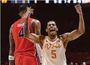  ?? Wade Payne/Associated Press ?? Tennessee guard Zakai Zeigler gets fans yelling as he reacts to being fouled during the second half against Auburn on Wednesday in Knoxville, Tenn.