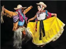  ??  ?? Itavivi Mendez (right) and Jesus Guzman, from Santiago Juxtlahuac­a, rehearse the “Dance of the Blondes”.