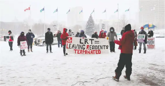  ?? TONY CALDWELL ?? ACORN protesters rally at city hall on Wednesday, hoping to save Manor Village from being demolished to make way for a new LRT route.