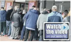  ??  ?? Fans queue for help at the Stadium of Light ticket office yesterday.