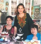  ??  ?? TEA. Inside Casa Bella, Elena Chua with Chinggay Utzurrum and Perla Agudo (left).