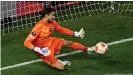  ?? ?? Eintracht Frankfurt goalkeeper Kevin Trapp saves Aaron Ramsey's penalty in the shootout