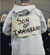  ?? Peter Foley European Pressphoto Agency ?? MICHAEL TOMMASIELL­O wore a handwritte­n sign on his jacket before the Public School show.