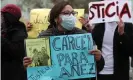  ?? Photograph: Martin Alipaz/EPA ?? A protester hold a sign that reads ‘Prison for Áñez’ at a vigil in the vicinity of the Miraflores women’s penitentia­ry in La Paz last month.