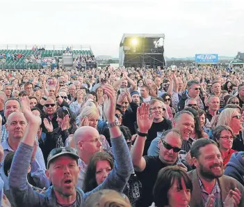  ?? Pictures: Kim Cessford. ?? Ricky Ross, top right, and the band play to a packed crowd as the weekend of musical entertainm­ent begins.