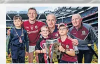  ??  ?? FAMILY MATTER Joe Canning with Micheal Donoghue and his three sons, Cian, Con and Niall with Liam Maccarthy Cup after the 2017 All-ireland final