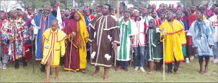  ?? (Pics: Sibusiso Zwane) ?? Archbishop Bhekibandl­a Vilakati (C) leading his church members to the Indian Ocean in Richards Bay, South Africa, where he cleansed them this past weekend.