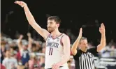  ?? BRYNN ANDERSON/AP ?? Connecticu­t’s Alex Karaban celebrates against Miami in the NCAA Tournament last season.