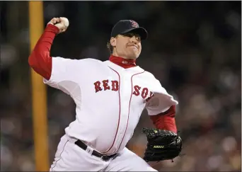  ?? KATHY WILLENS — THE ASSOCIATED PRESS FILE ?? Boston’s Curt Schilling pitches against the Rockies in Game 2of the 2007World Series at Fenway Park in Boston.