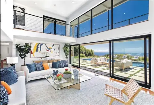  ?? Anthony Barcelo ?? THE MALIBU home of Robert Conrad faces a stretch of beach where the “Wild, Wild West” actor learned to surf in the 1950s.