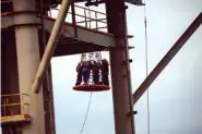  ?? NEW YORK TIMES NEWS SERVICE ?? Workers board an oil and gas platform run by Energy XXI in the Gulf of Mexico, south of Port Fourchon, La., on Saturday. Energy XXI, which has been cited for workplace safety violations at a rate much higher than the industry average, is among the...