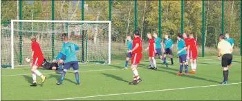  ??  ?? Lowson goalkeeper Fraser Reid saves from Lewis Cameron.