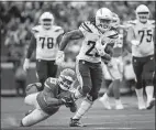  ?? REED HOFFMANN/AP PHOTO ?? In this Oct. 13, 2019 file photo, New Orleans Saints guard Andrus Peat sets up to block during the second half of a game against the Jacksonvil­le Jaguars in Jacksonvil­le, Fla.
In this Dec. 29, 2019, file photo, Los Angeles Chargers running back Melvin Gordon (25) runs past Kansas City Chiefs inside linebacker Anthony Hitchens (53) during a game in Kansas City, Mo.