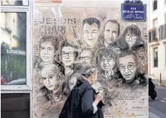  ??  ?? A painting by Christian Guemy in tribute to members of ‘Charlie Hebdo’ newspaper.