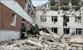  ?? Picture: Ukrainian Emergency Service via AP Photo ?? Rescuers work at the site of a Russian missile strike in Chernihiv, Ukraine, yesterday