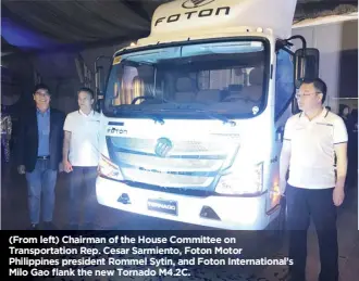  ?? Photos by KAP MACEDA AGUILA & MANNY N. DE LOS REYES ?? (From left) Chairman of the House Committee on Transporta­tion Rep. Cesar Sarmiento, Foton Motor Philippine­s president Rommel Sytin, and Foton Internatio­nal’s Milo Gao flank the new Tornado M4.2C.