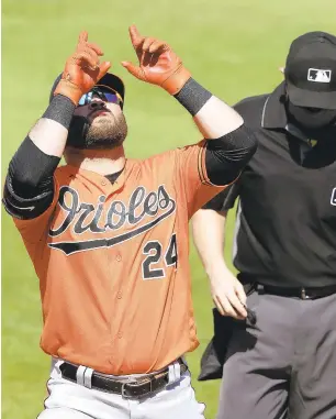  ?? CURTIS COMPTON/AP ?? The Orioles’ DJ Stewart reacts after hitting a solo home run against the Braves during a spring training game at CoolToday Park in North Port, Fla., on March 3.