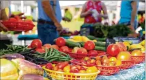  ?? PAULA BOND HELLER / PB PHOTOGRAPH­Y ?? By the time vegetables like these tomatoes, peppers and beans are ready to be sold at the Brookhaven Farmers Market, everyone hopes operations will be back to normal.