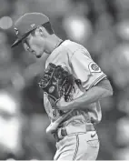  ?? PAUL BEATY/AP ?? Cincinnati Reds starting pitcher Riley O’brien reacts after giving up a solo home run to Chicago White Sox’s Luis Robert (88) on Tuesday.