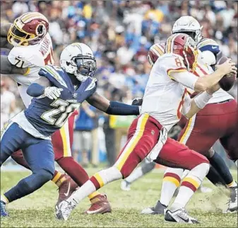  ?? Robert Gauthier Los Angeles Times ?? CHARGERS CORNERBACK Desmond King, sacking Washington quarterbac­k Kirk Cousins this month, has become a bigger piece of the team’s resurgent defense as the season has progressed.