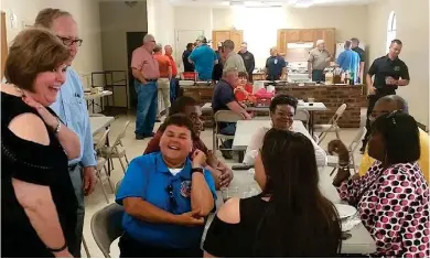  ?? (Photo by Steve Rogers, Daily Times Leader) ?? Blissard shares a laugh with fellow EMA personnel, from left, Linda Griffin of Chickasaw County, Kristen Campanella of Oktibbeha County, Cindy Lawrence of Lowndes County and Jarvis Boyd of Oktibbeha County.