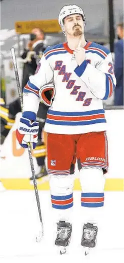  ?? GETTY ?? Dejected Chris Kreider leaves ice after Bruins’ victory Thursday.