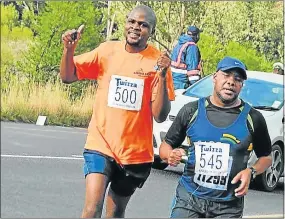  ?? Picture: FILE ?? EASY: From left, Bulela Sidloyi and Camilles Fourie in the 2013 Bonkolo Marathon