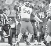  ?? ANDY LEWIS USA TODAY Sports ?? UM’s Leonard Taylor III celebrates a sack in the second half against Temple in Philadelph­ia last September.