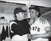  ?? THE ASSOCIATED PRESS — 1963 ?? Giants’ pitcher Juan Marichal, left, congratula­tes Willie Mays, whose 16th-inning home run beat Warren Spahn.