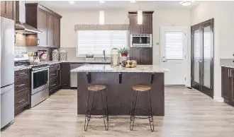  ??  ?? The kitchen in the Beckett show home. Townhomes in the developmen­t start at $299,900.