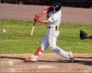  ?? ?? Valleycats’ Jesus Lujano connects with a pitch during their game against Trois-rivieres Aigles.