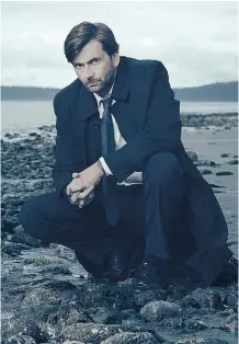  ?? Mathieu Young/Fox ?? David Tennant stars as Det. Emmett Carver in Gracepoint.