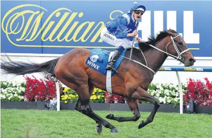  ?? Picture / Getty Images ?? Winx takes the second step to emulating Kingston Town’s three Cox Plates on Saturday.