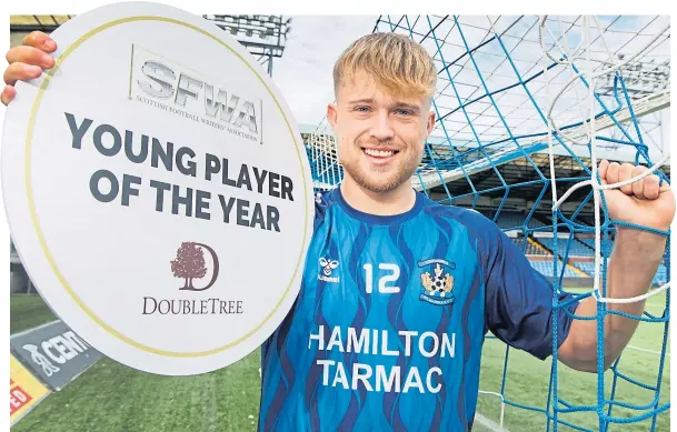  ?? ?? Kilmarnock midfielder David Watson celebrates an excellent season and winning the SFWA Scottish Young Player of the Year award.