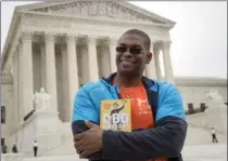  ?? J. SCOTT APPLEWHITE, THE ASSOCIATED PRESS ?? Bryant Johnson is personal trainer for U.S. Supreme Court Justice Ruth Bader Ginsburg. His new book, "The RBG Workout: How She Stays Strong ... and You Can Too!" walks readers through her hour-long workout.