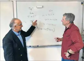  ??  ?? Discussing computatio­nal equations: Prof Derrick Kourie (left) and Prof Bruce Watson, both from the informatio­n science department at Stellenbos­ch University, discuss computatio­nal equations for a research project investigat­ing algorithm improvemen­ts...