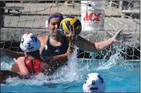  ?? COURTESY PHOTO BY NATALIE VICE ?? Lodi's Jenna Bigelow takes a shot during Thursday's water polo victory over West.