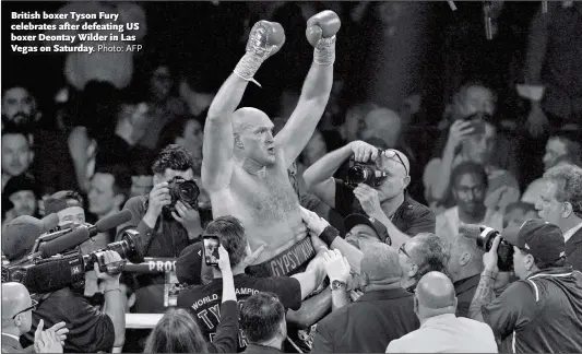  ?? Photo: AFP ?? British boxer Tyson Fury celebrates after defeating US boxer Deontay Wilder in Las Vegas on Saturday.