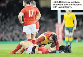  ??  ?? Leigh Halfpenny receives treatment after the incident with Samu Kerevi.