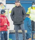  ??  ?? Dundee boss James Mcpake can’t disguise how he feels