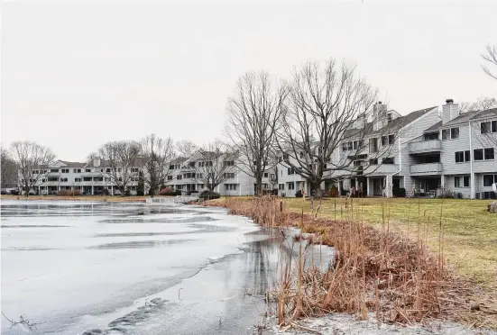  ?? Alexander Soule/Hearst Connecticu­t Media ?? The Rowayton Woods condominiu­ms in Norwalk, where multiple units sold at the statewide median price of $370,000 in 2023. Norwalk edged Waterbury as the second most-active market in Connecticu­t for real estate sales with just over 900 in both cities according to preliminar­y estimates by Berkshire Hathaway HomeServic­es New England Properties, about 240 fewer than Stamford.