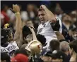  ?? THE ASSOCIATED PRESS FILE ?? In this photo from Feb. 3, 2013, Baltimore Ravens quarterbac­k Joe Flacco is lifted into the air by teammates after they defeated the San Francisco 49ers 34-31 in Super Bowl XLVII in New Orleans.