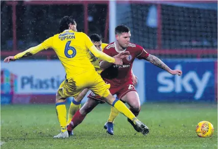  ?? Picture: Robbie Stephenson/JMP ?? Rovers’ Ed Upson tries to stop Accrington striker Billy Kee