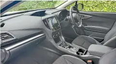  ??  ?? The current Impreza interior boasts way less hard plastic than Imprezas of old. Quite a number of screens though.