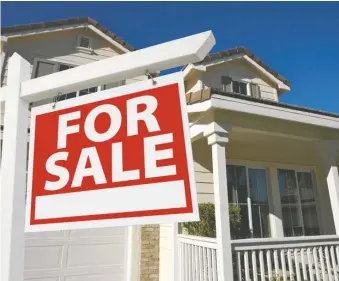  ?? ?? The median down payment for Calgary homebuyers was $25,000 in October, down sharply from the peak of $72,400 in February, says Chase Belair, a principal broker with online mortgage broker Nesto.