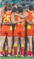  ??  ?? Gold Coast Suns players during the loss to Port Adelaide.