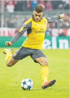  ?? — AFP photo ?? Arsenal's midfielder Alex Oxlade-Chamberlai­n controls the ball during the UEFA Champions League round of sixteen football match between FC Bayern Munich and Arsenal in Munich, southern Germany, on February 15, 2017.