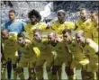  ?? TED S. WARREN — THE ASSOCIATED PRESS FILE ?? Columbus Crew players pose for the traditiona­l team portrait before a match against the Seattle Sounders on May 5 in Seattle.